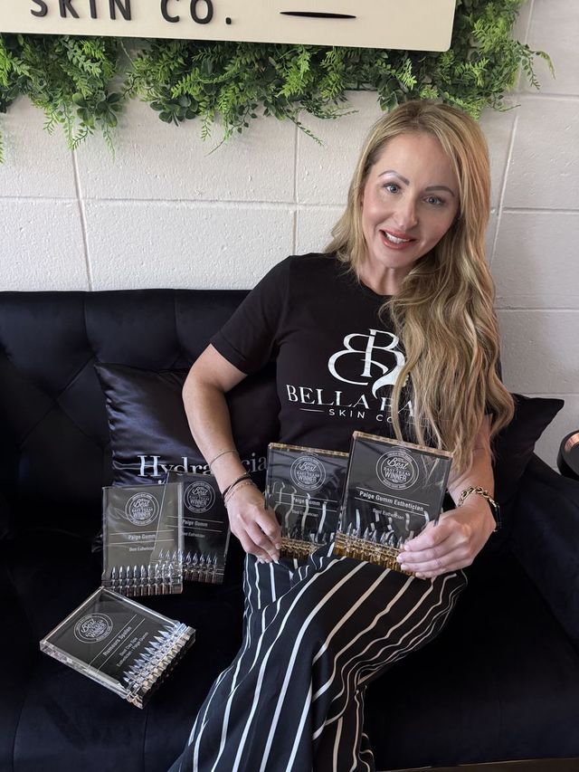 Paige with her Best of East Texas Best Esthetician awards, voted 5 years in a row